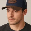 Gorra Trucker Premium Parche Logo