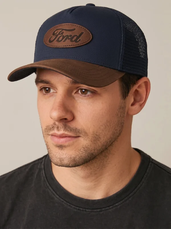Gorra Trucker Premium Parche Logo